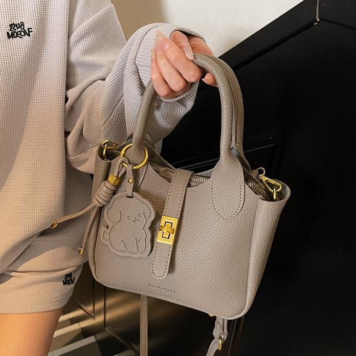 Este año, la popularidad de la bolsa de cubo para mujeres de alta calidad 2025 nuevo bolso casual de moda, bolso de hombro de moda