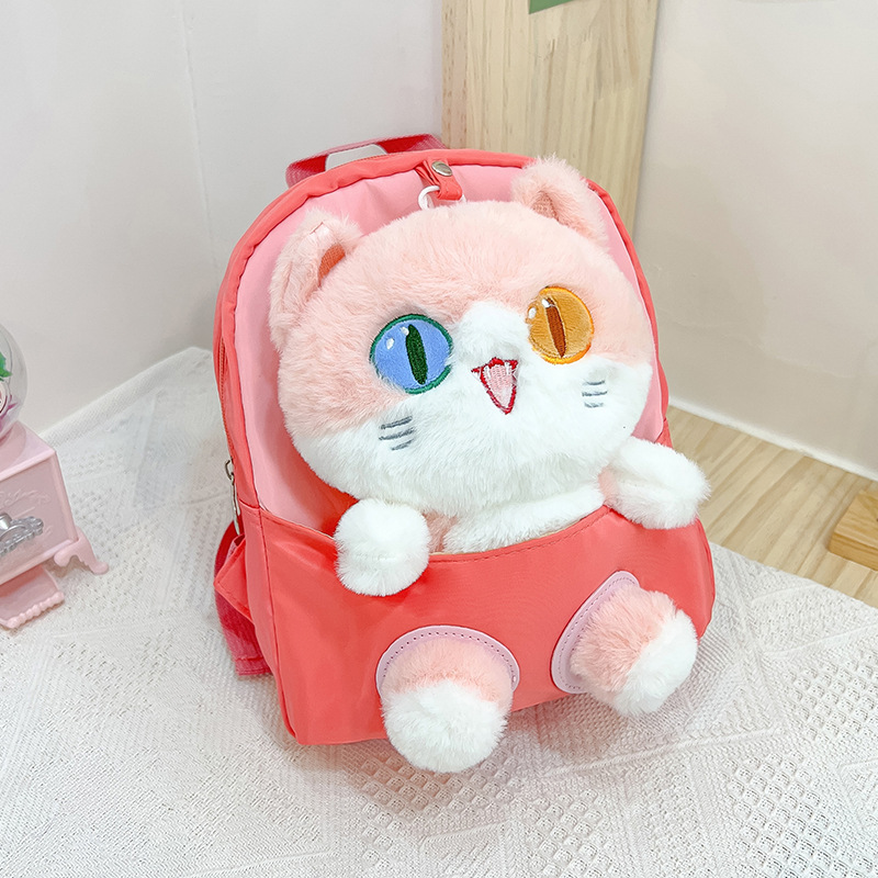 Nueva mochila de dibujos animados para niños tendencia pupila diferente gato muñeca mochila desmontable jardín de infantes en stock