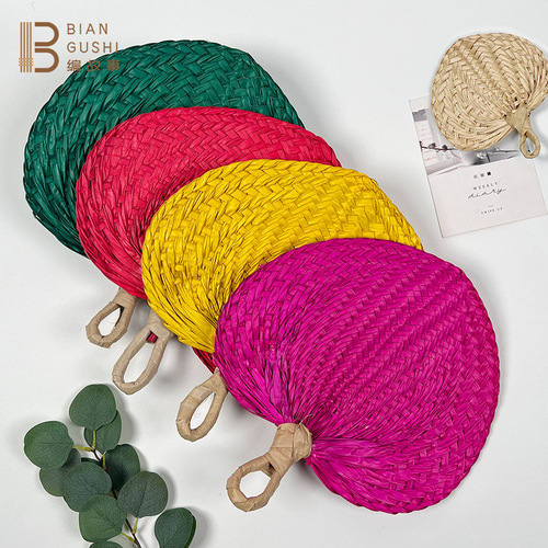 Rustic-style natural palm-leaf woven fan for summer cooling and mosquito repellent—large, handcrafted, and perfect for a gentle breeze.