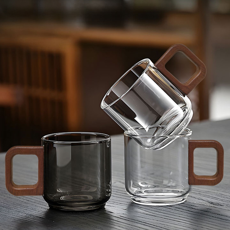 Taza de té pequeña de vidrio con asa, taza de té kung fu transparente, taza de degustación de vidrio de borosilicato alto, taza pequeña con asa, taza de té del fabricante.