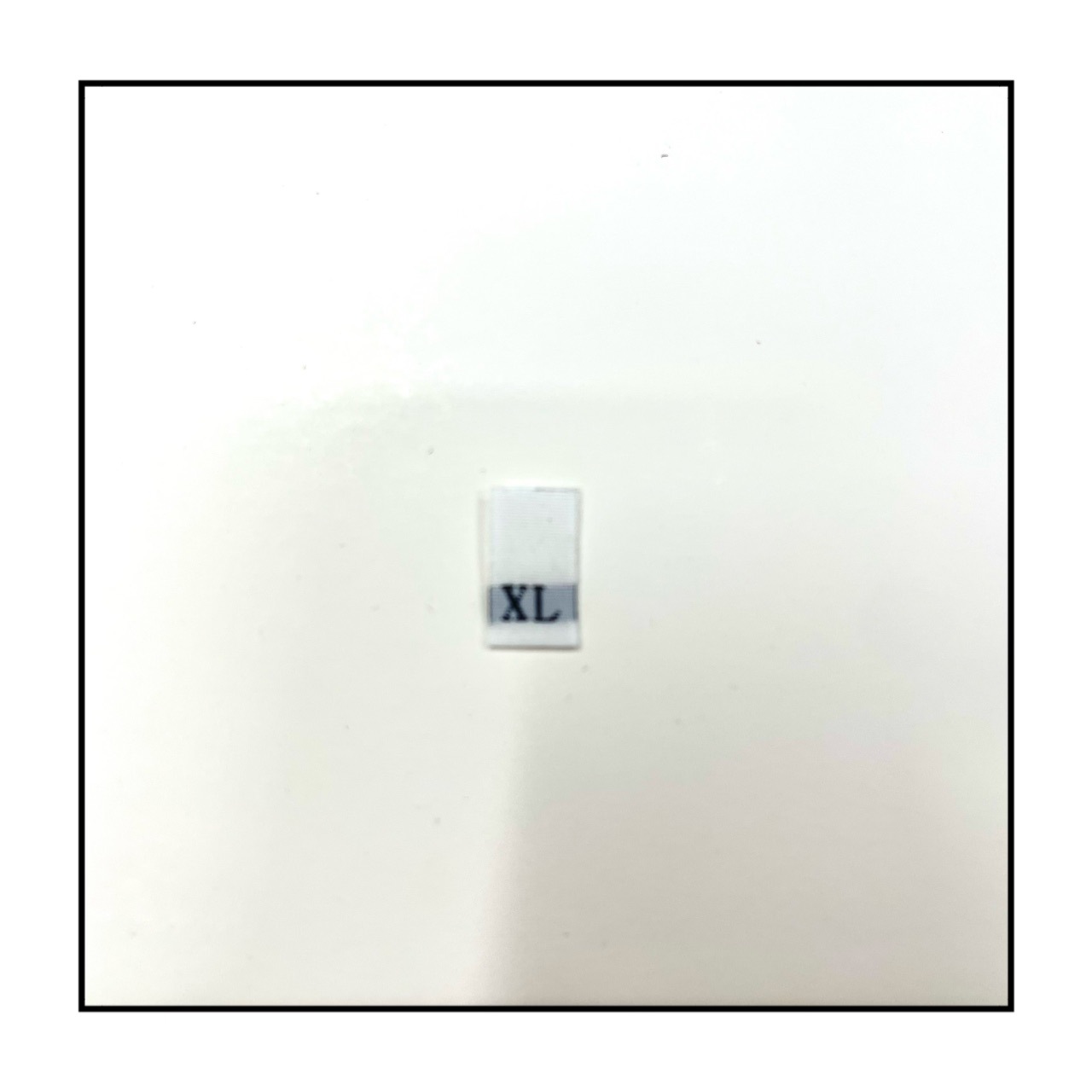 厂家直销现货黑色白色 通用服装大小字母标 切好对折尺码标尺码唛