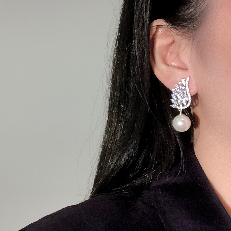 Boucles d oreilles pendantes perle ailes d ange élégantes_voghion.com