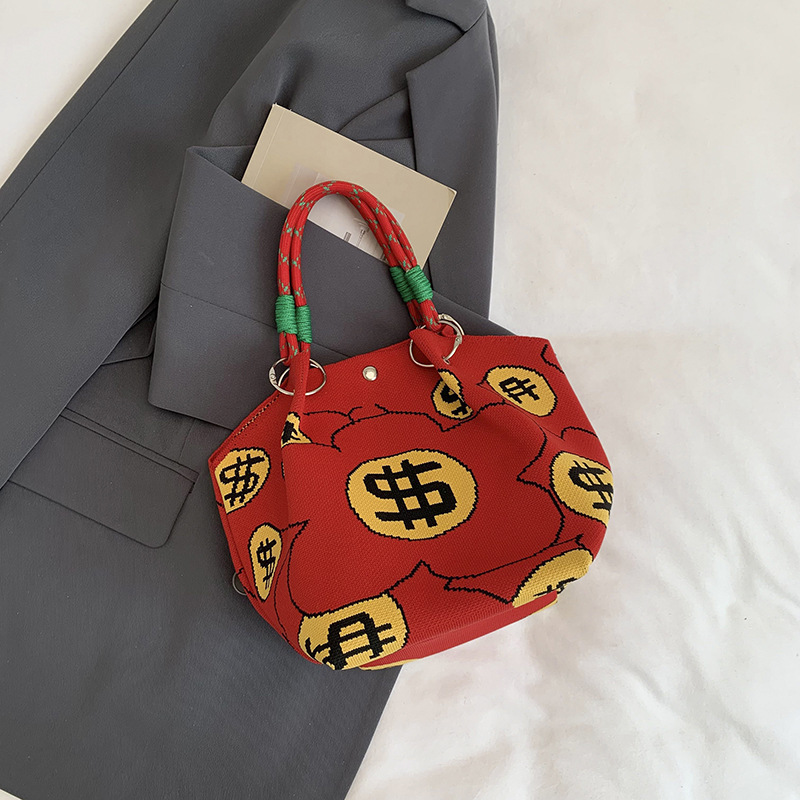 Bolsa de impresión coreana de niña nicho bolso de cubo de diseño diario versátil bolso de mano para estudiantes de viaje diario