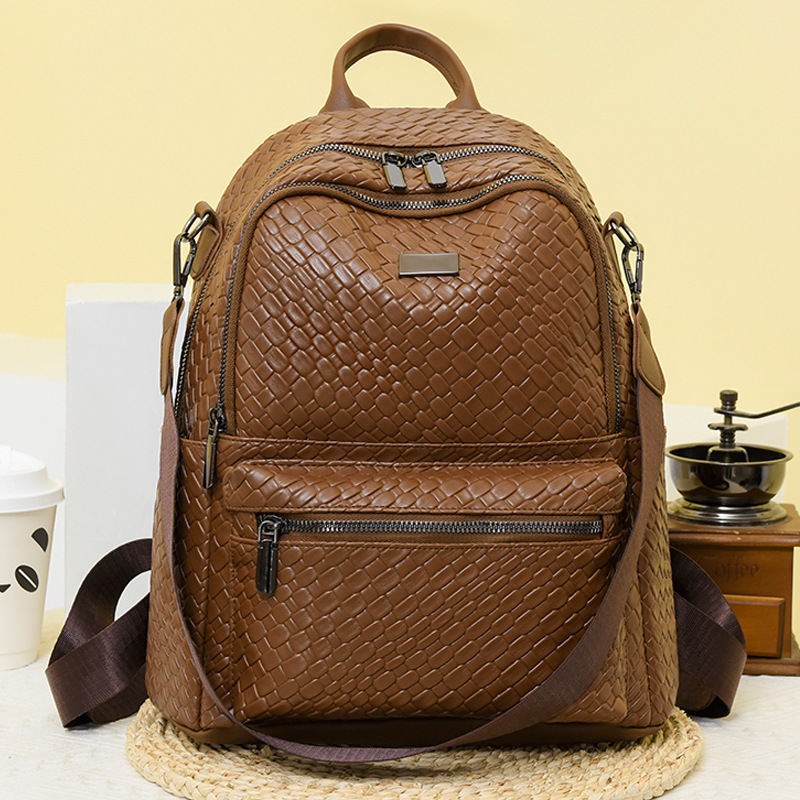 Comercio exterior al por mayor 2023 nueva mochila de cuero suave para mujer súper caliente para viajes urbanos mochila de doble uso al aire libre de gran capacidad