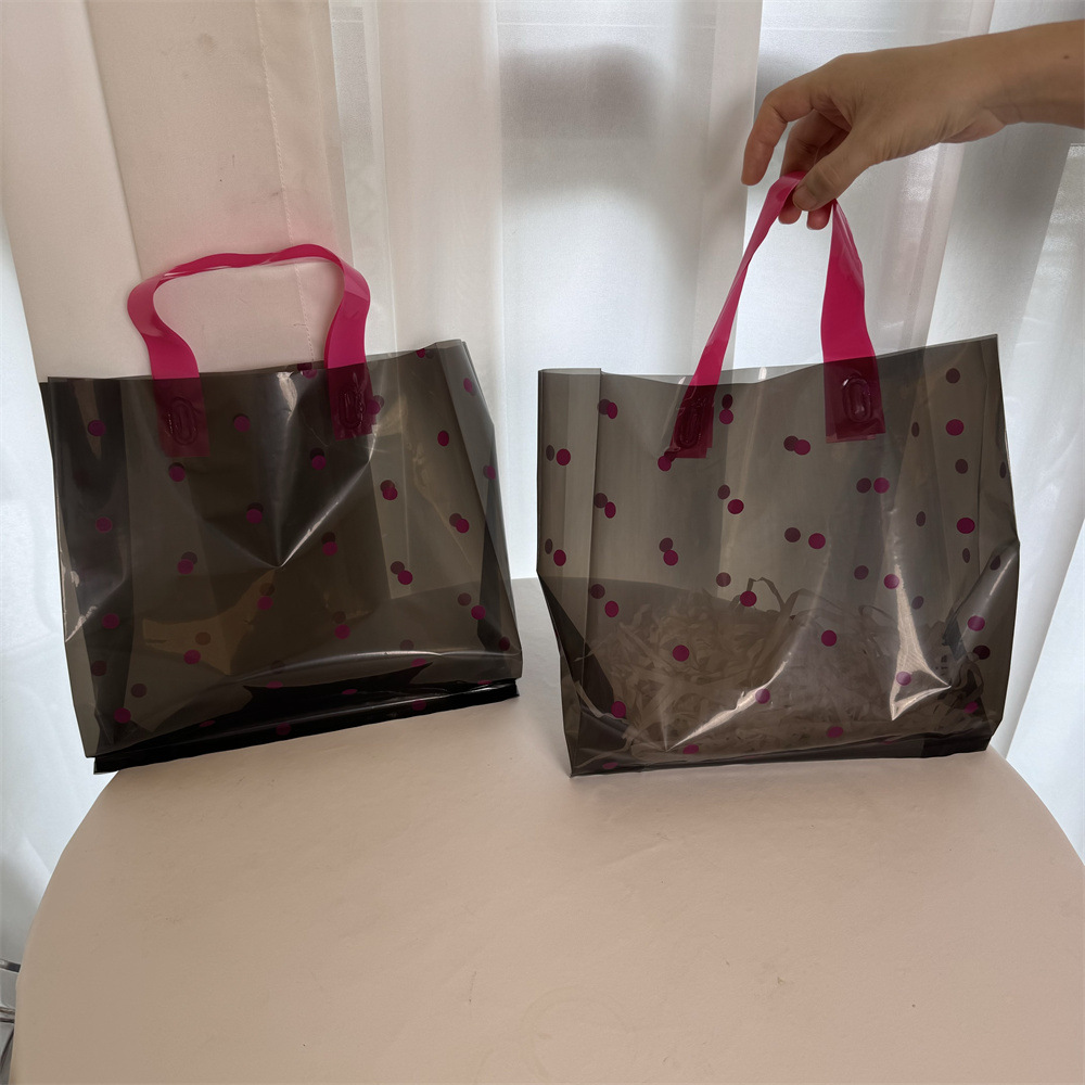 新服装店手提袋女装高级包装购物塑料袋子礼品打包专用带现货批发