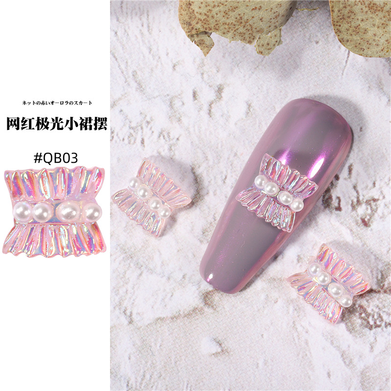 Accesorios de falda de arte de uñas 2021 nueva celebridad de Internet pequeño libro rojo estilo caliente hada aurora falda plisada decoración de uñas