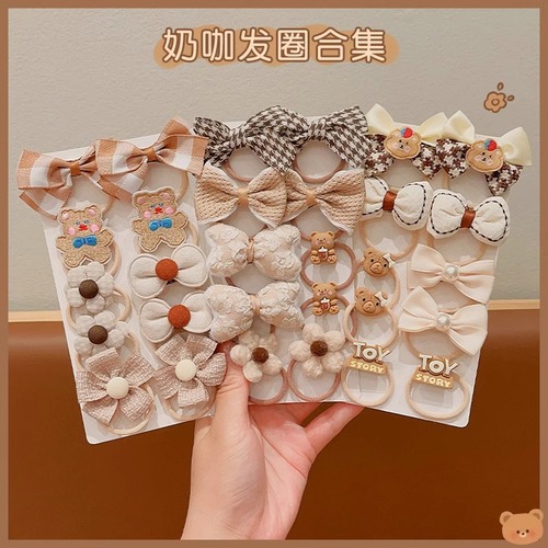 Milky brown ten-piece set of children's hair ties with high elasticity and no damage to the hair. Rubber bands and hair ropes to tie the hair. Cute baby hair accessories.