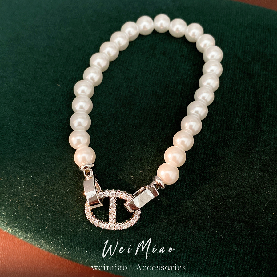 Pulsera de perla de nariz de cerdo de piedra de diamante redonda, pulsera ligera y lujosa, pulsera de nicho, joyas de moda versátiles.