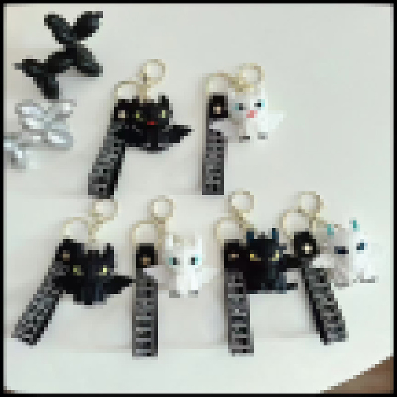 Cross-border creative black and white dragon doll key chain pendant bag car key chain accessories small gifts wholesale