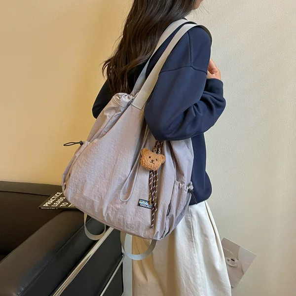 Japanese-style casual large-capacity drawstring crossbody bag for women, 2026 new lightweight shoulder tote bag for commuting