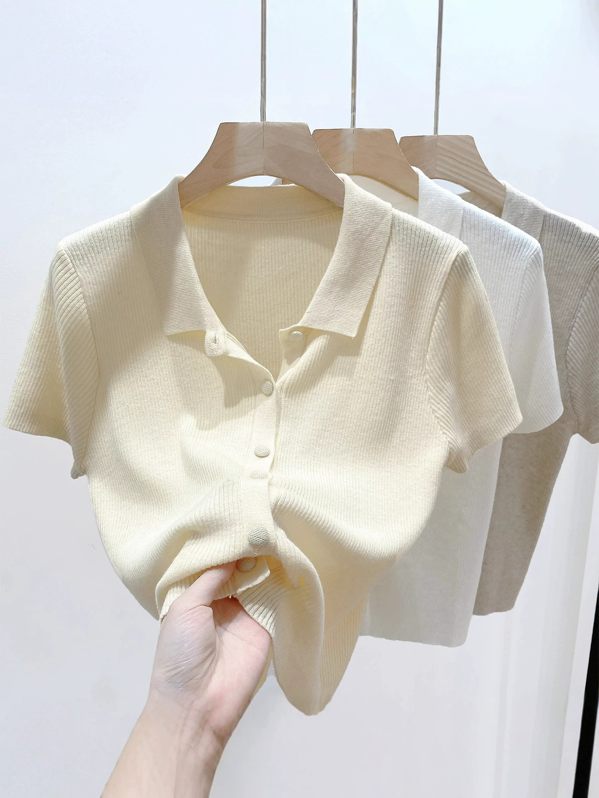 Áo thun polo nữ tay ngắn cổ bẻ chất liệu len lụa mát mẻ — màu trắng