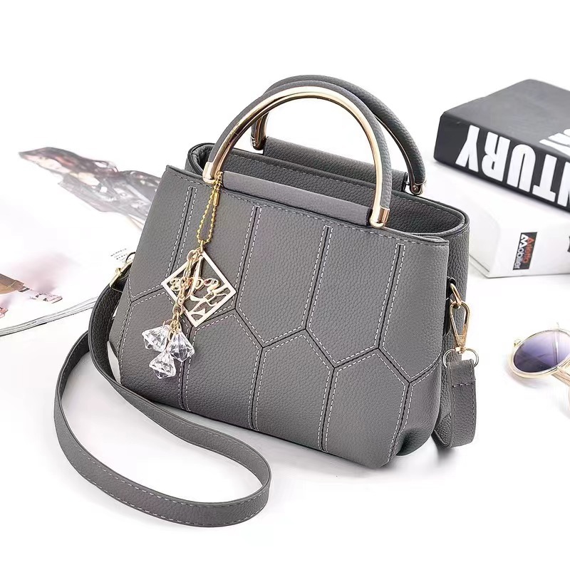 Bolso bandolera transfronterizo, bolso de mano pequeño, nuevo estilo moderno, bolso simple, bolso de hombro con bordado de hilo, bolso compacto.