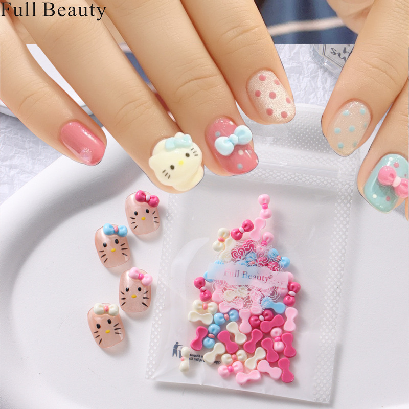 Cross-border new cute nail jewelry DIY hello kitty four-color bow nail jewelry