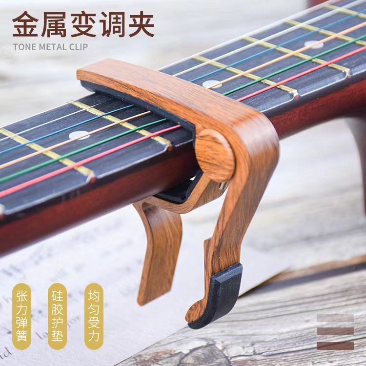 Amazon Hot sale folk guitarra de madera tuner ukulele tuner clip guitarra accesorios de guitarra capo