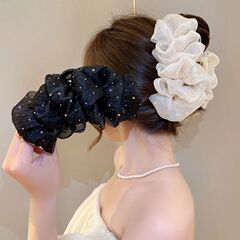 雲の泡は大きな蝶結びを挟んで女性の網糸サメを挟んで後頭部の満天の星の髪の毛を挟んで髪を飾ります。