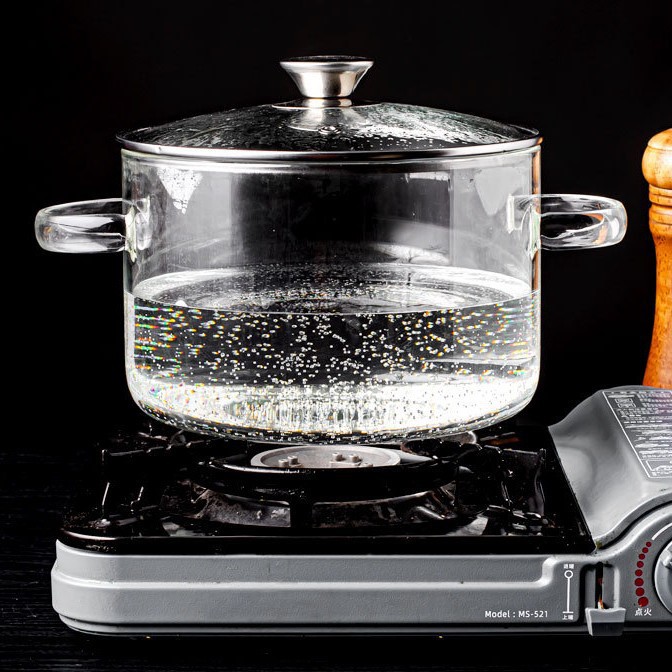 Fabricante mayorista de alto borosilicano puede quemar directamente la olla de vidrio de fuego abierto resistente a altas temperaturas transparente de doble oreja de aluminio para el hogar