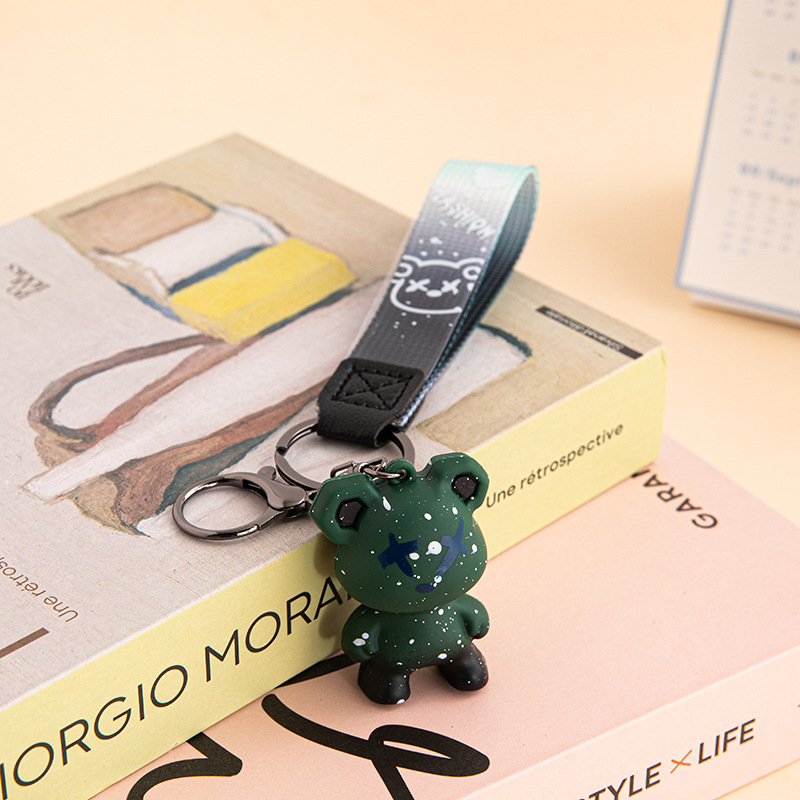 Creativo, colorido, violento, muñeca de oso de dragón, método de lucha de perros, llavero de muñeca de moda, llavero de personalidad de coche