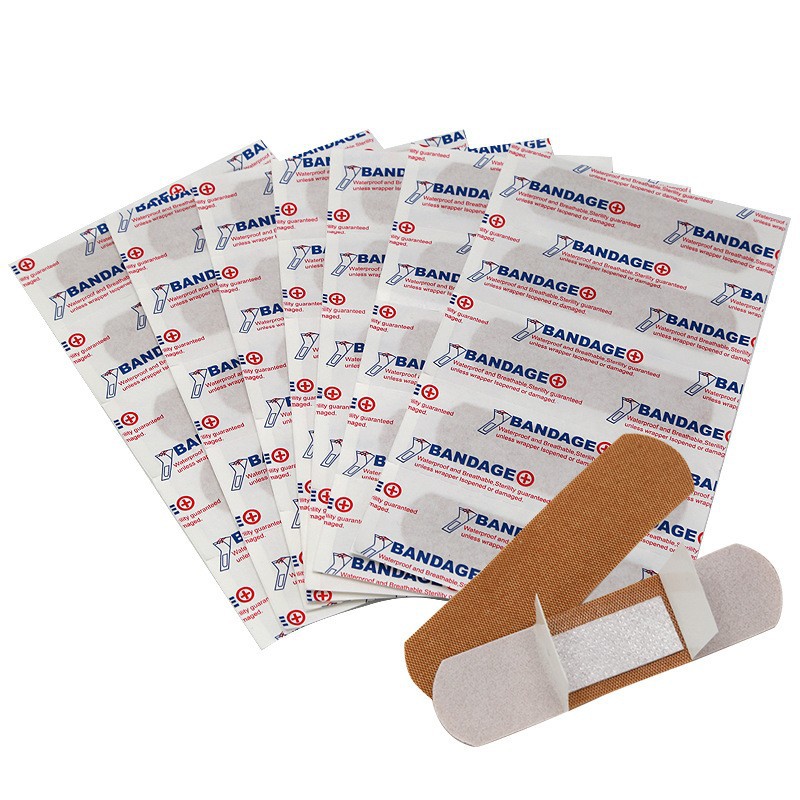 Comercio exterior transfronterizo Inglés pegamento de algodón color de piel elástico pegamento hemostático impermeable pegamento permeable vendaje de heridas pequeñas