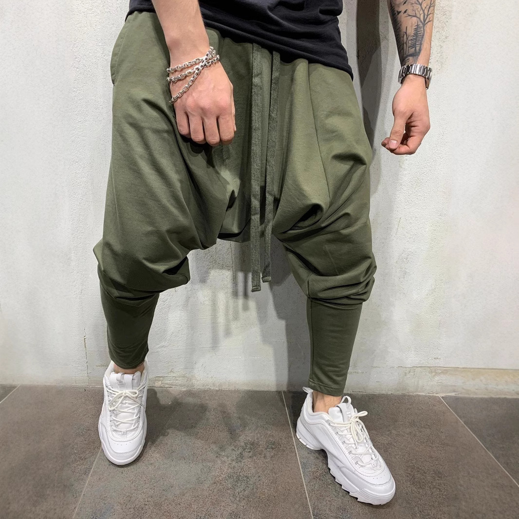 2022 de los nuevos hombres hip hop moda Pantalones europeos y americanos flojos color sólido flacos calle deportes casual harem