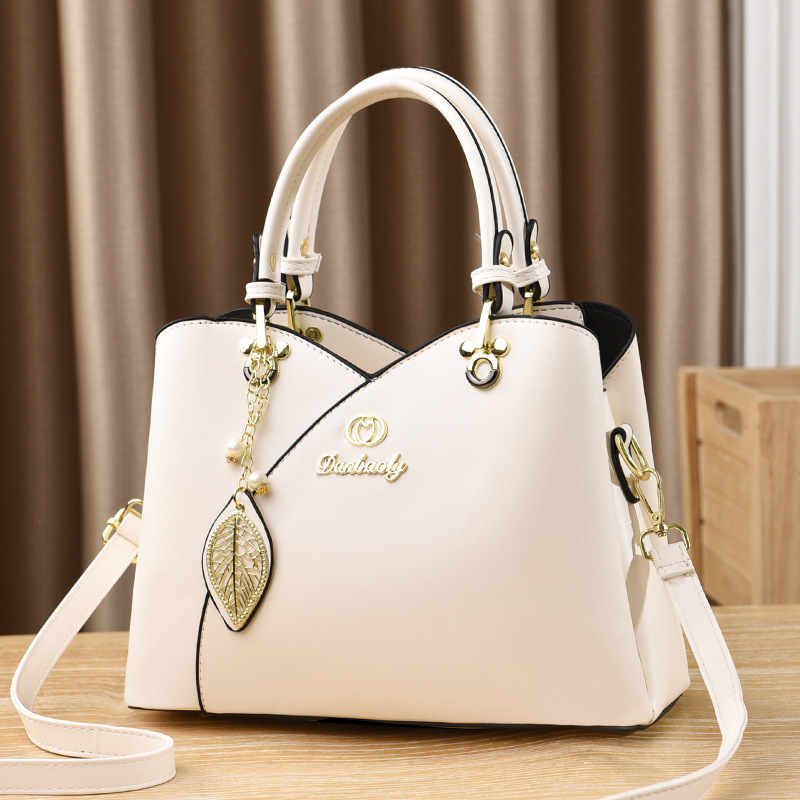 Bolso bandolera para mujer nuevo versátil bolso de mamá moda de verano bolso de mano de un solo hombro 2025 fabricante comercio exterior elegante para mujer.