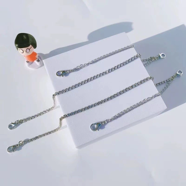 A row of white crystal hook models