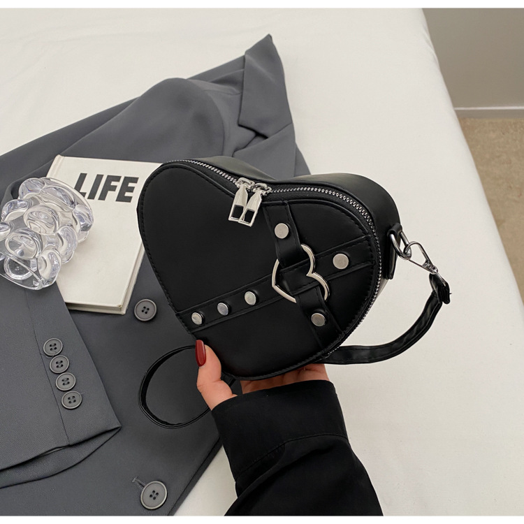 Internet celebridad personalizada de moda del todo-fósforo de color sólido en forma de corazón bolsa de costura bolsa de las mujeres nicho diseño crossbody hombro bolsa de las axilas