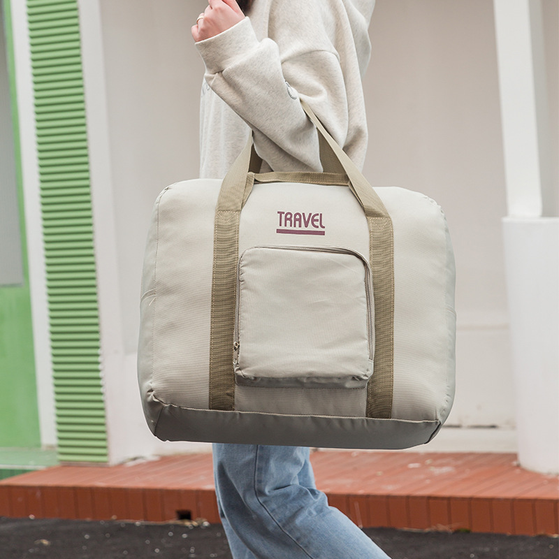 2023 primavera viaje de viaje bolsa de almacenamiento de doble capa impermeable engrosada carro Portátil Bolsa de hombro viaje de larga distancia bolso