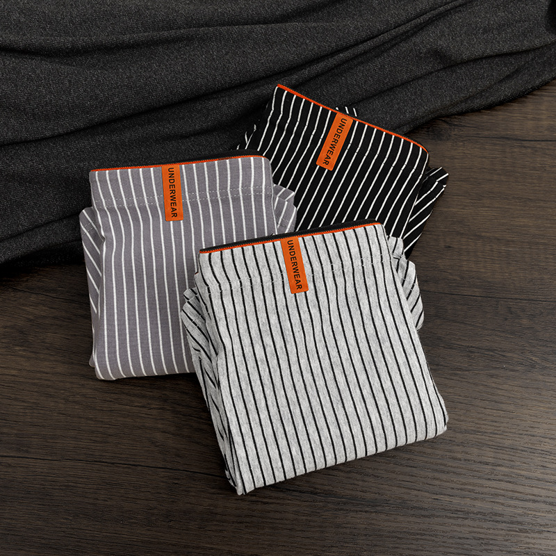 Pantalones interiores de hombre algodón antibacteriano Xinjiang pantalones planos juveniles vitalidad pantalones cortos a rayas verticales al por mayor