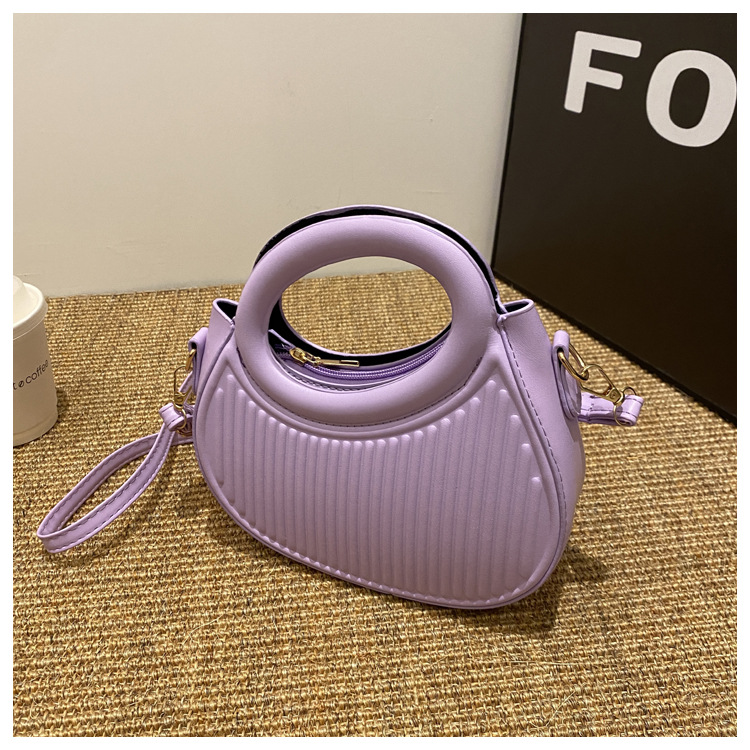 Fresco dulce dopamina color sólido rayas bolso de las mujeres este año popular pu estilo occidental bolso de hombro redondo
