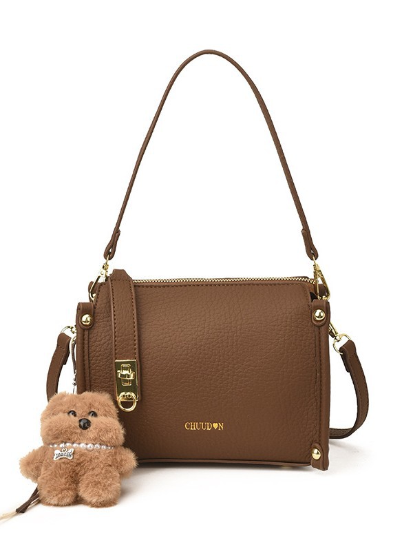 Bolsos retro retro de alta calidad para mujeres 2026 nueva textura lichi bolso pequeño estilo coreano simple mochila de hombro