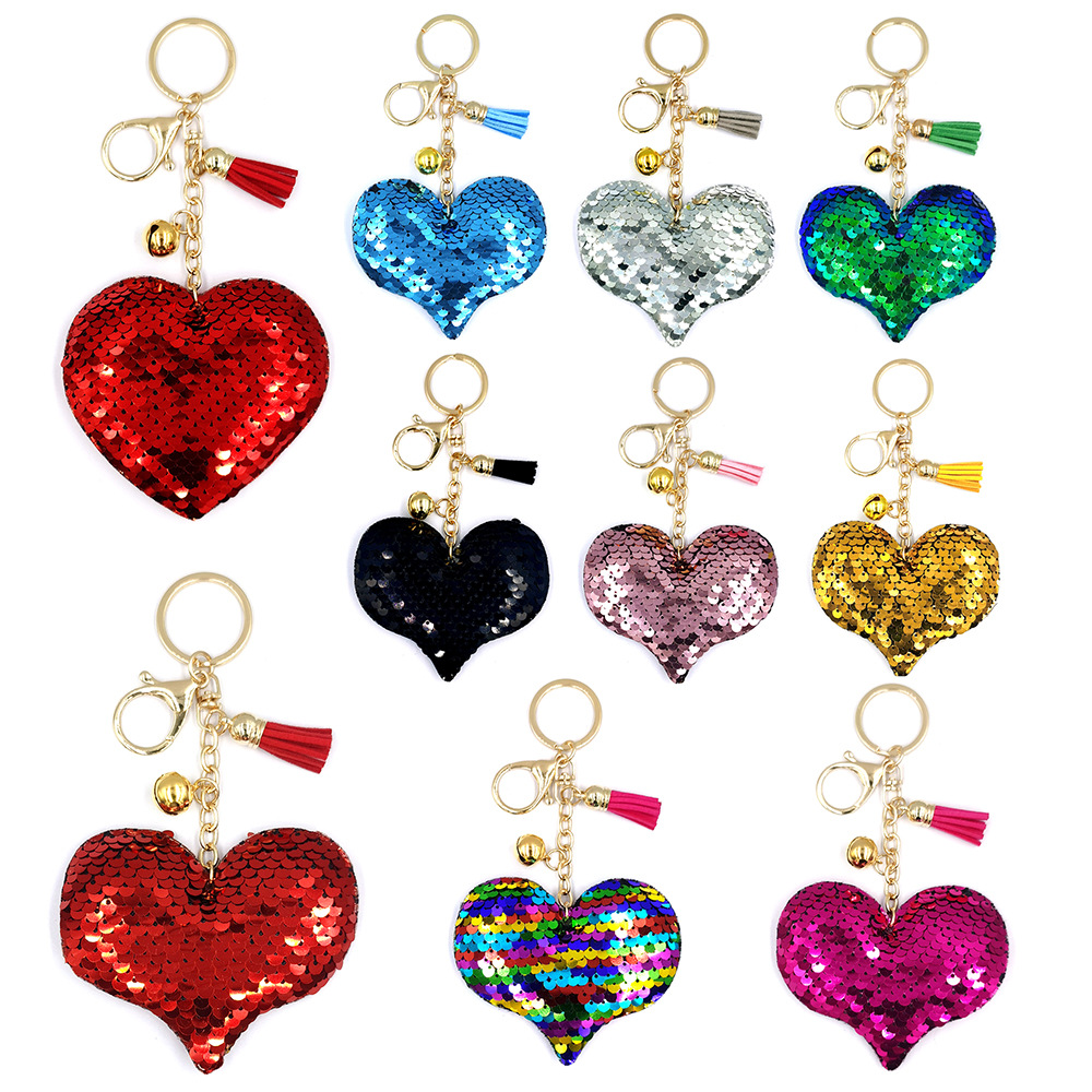 Retroreflective glossy small bell heart-shaped with tassels