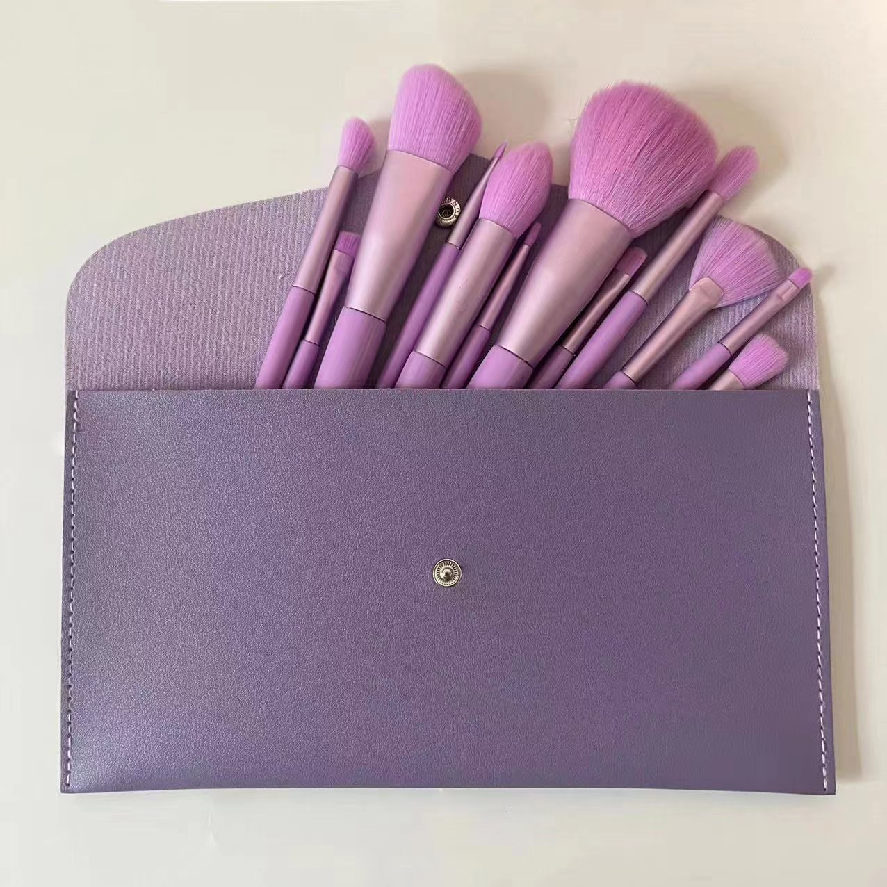 Erxiaomu Xingdong 12 maquillaje cepillo conjunto portátil conjunto completo Cangzhou polvo suelto rubor reparación nariz cepillo suave pelo sin costuras