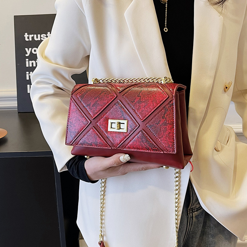 2024 nuevo bolso de mujer serpiente empalmado bolso de cadena de moda europea y americana bolso de hombro de mujer bolso de mujer