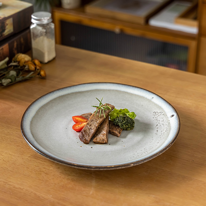 Bandeja plana roscada de viento, plato de cerámica japonesa, vajilla redonda especial para el hogar, plato grande, plato de carne occidental