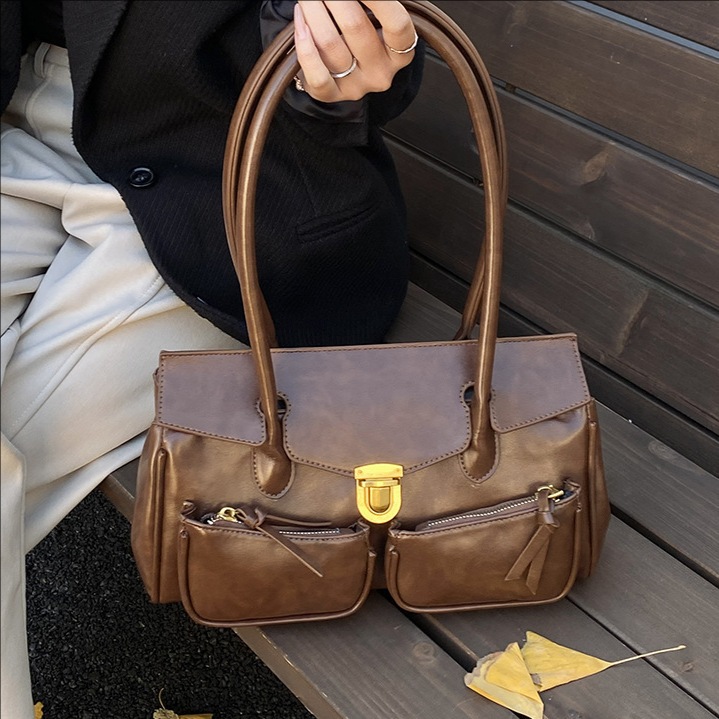 Bolso de mujer de explosión transfronteriza, bolso de tracción retro, bolso de viaje, bolso de hombro, maletín de brazo, bolso de hombro