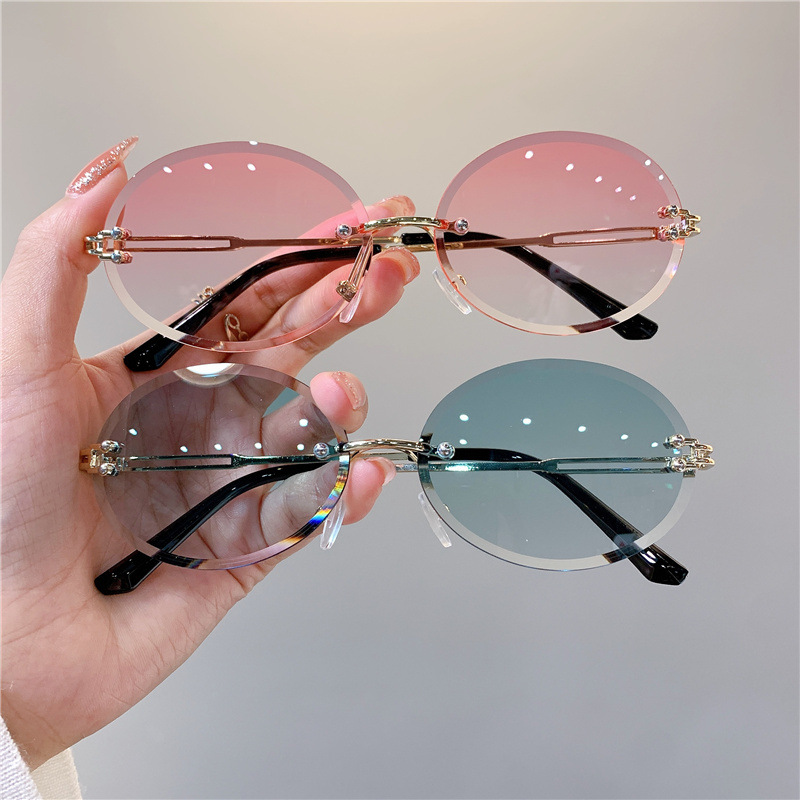 New Sunglasses Women's Oval Gradient Sunglasses Frameless Cutting Edge Trendy Glasses_voghion.com