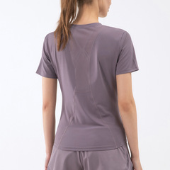 国境を越えた欧米の春夏の新商品のフィットネス服の女性のランニング運動のつづりの半袖のtシャツは身を修めてやせているヨガの服の女性を現します。
