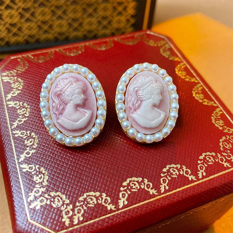 Silver Needle Pearl Portrait earrings