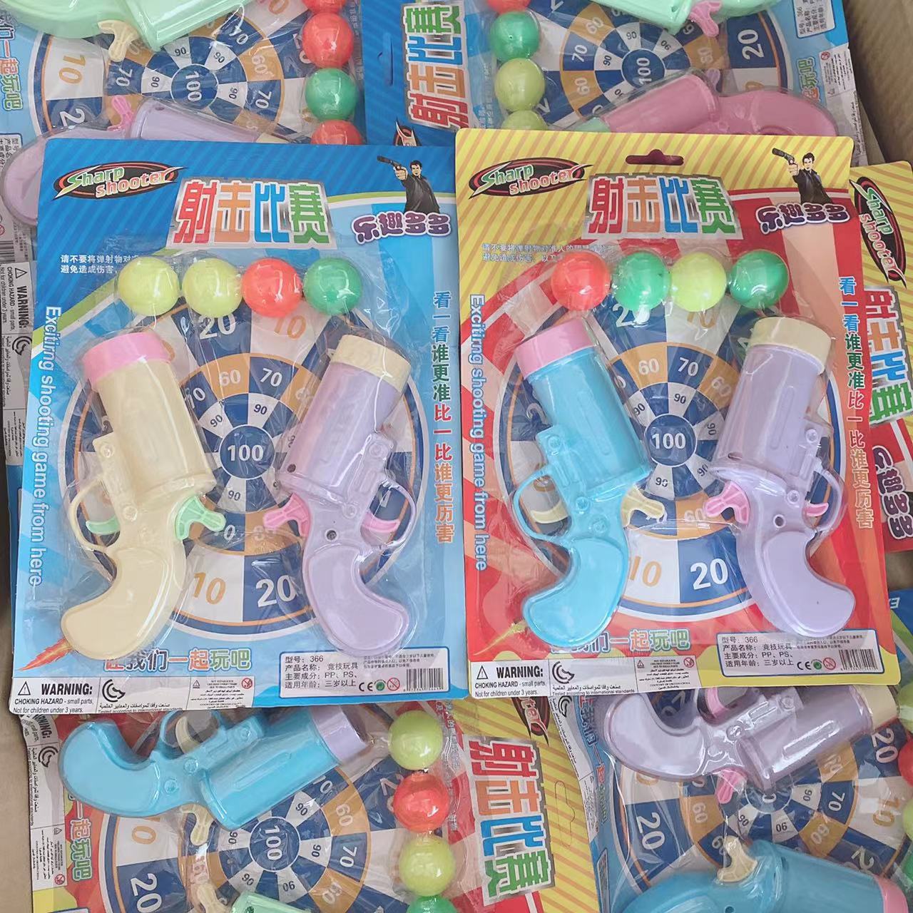 Juguetes para niños playa Tarjeta de succión juguete pistola juego casa juguete pintura juguetes 2 yuanes grandes almacenes al por mayor