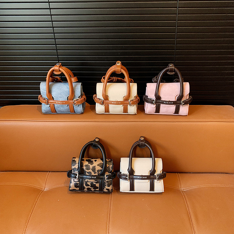 Moda coreana de patrón de leopardo, bolso de hombro para niños y niñas, bolso mini para niños con letras extranjeras, bolso de accesorios para niños.