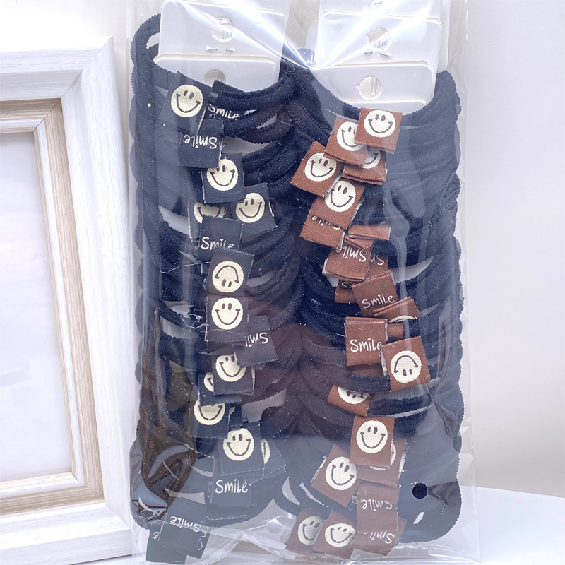 Caqui fresa oso etiqueta de tela anillo de pelo rojo leche té color 03 amor banda de goma lazo de pelo de las mujeres 2 yuanes tienda física