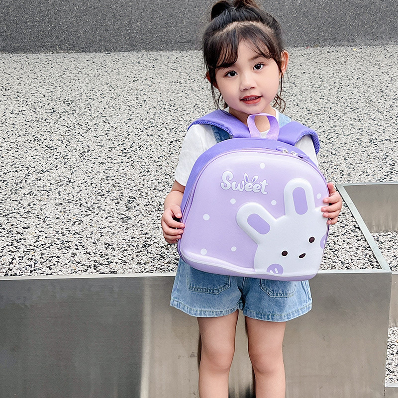 Jardín de infantes lindas mochila de dibujos animados para niños, mochila de cáscara de huevo de conejo, mini mochila para niños y niñas.