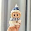 Blue moxa hat + blue and white scarf + white smiling pin shirt