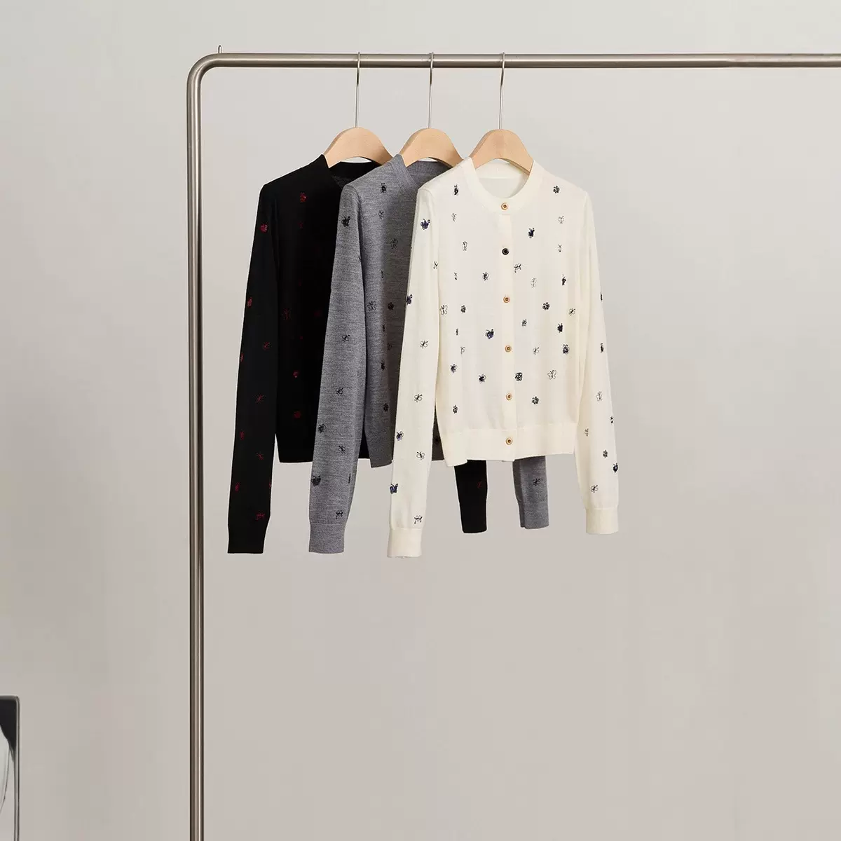 新澳绵羊毛针织开衫女2025秋冬新品波点减龄显瘦上衣圆领长袖外套