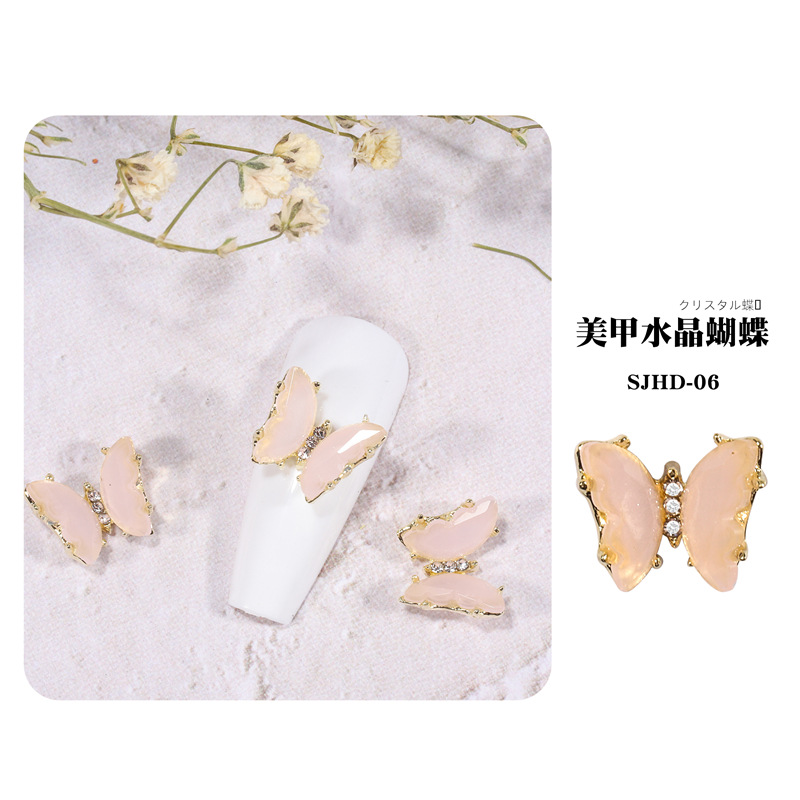 2021 nueva celebridad en línea belleza de uñas mariposa de cristal mágico estilo INS hielo tridimensional transparente Aurora diamante metal decoración de uñas