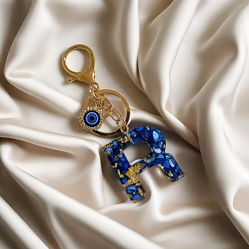 クロスボーダー新樹脂サファイアブルー英字キーホルダー悪魔の目レディースバッグペンダントスクールバッグペンダント|undefined