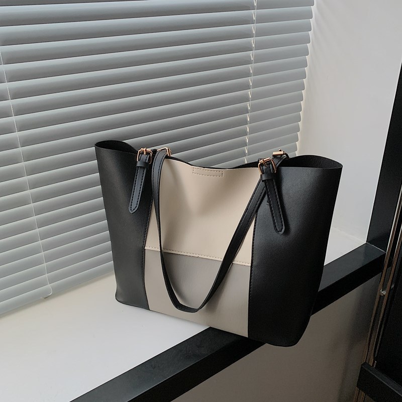 Bolso de cercanías atmosférico para mujer, estilo occidental de gran capacidad 2025 verano nuevo estilo retro simple bolso portátil de un solo hombro para mujer