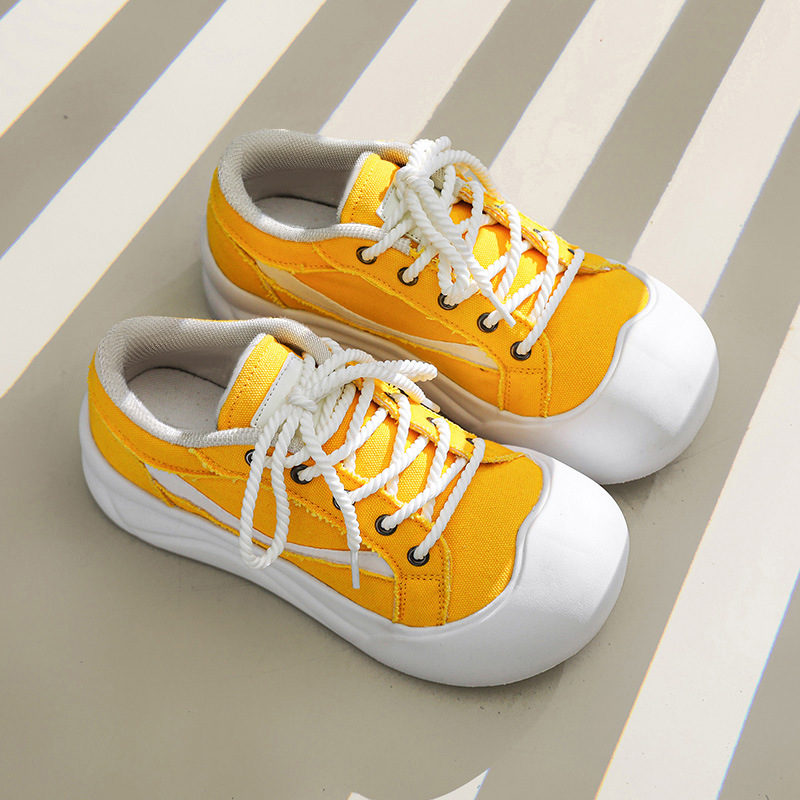 Zapatos de punta grande feos y lindos de nicho, zapatos de lona de otoño coreanos de suela gruesa con absorción de impactos, zapatos casuales bajos cómodos y versátiles