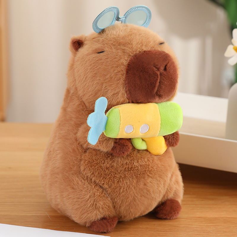 Fábrica de stock al por mayor de la nariz genuina osos muñecas de peluche colgantes capibara muñecas bolsas colgantes