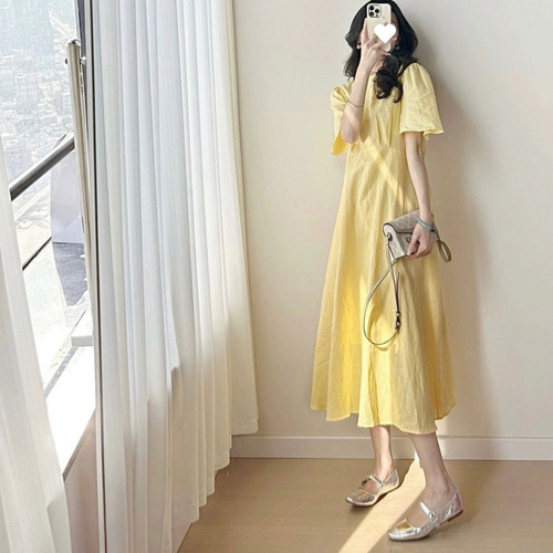 A charming French-style tea party dress for women that captivates at first glance, perfect for summer 2025 vacation fashion.